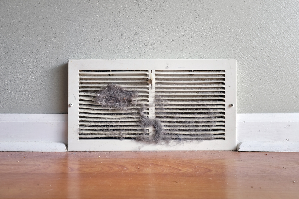 Dirty wall vent covered with dust